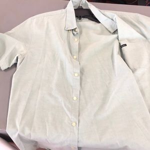 Faded green gently used button down shirt